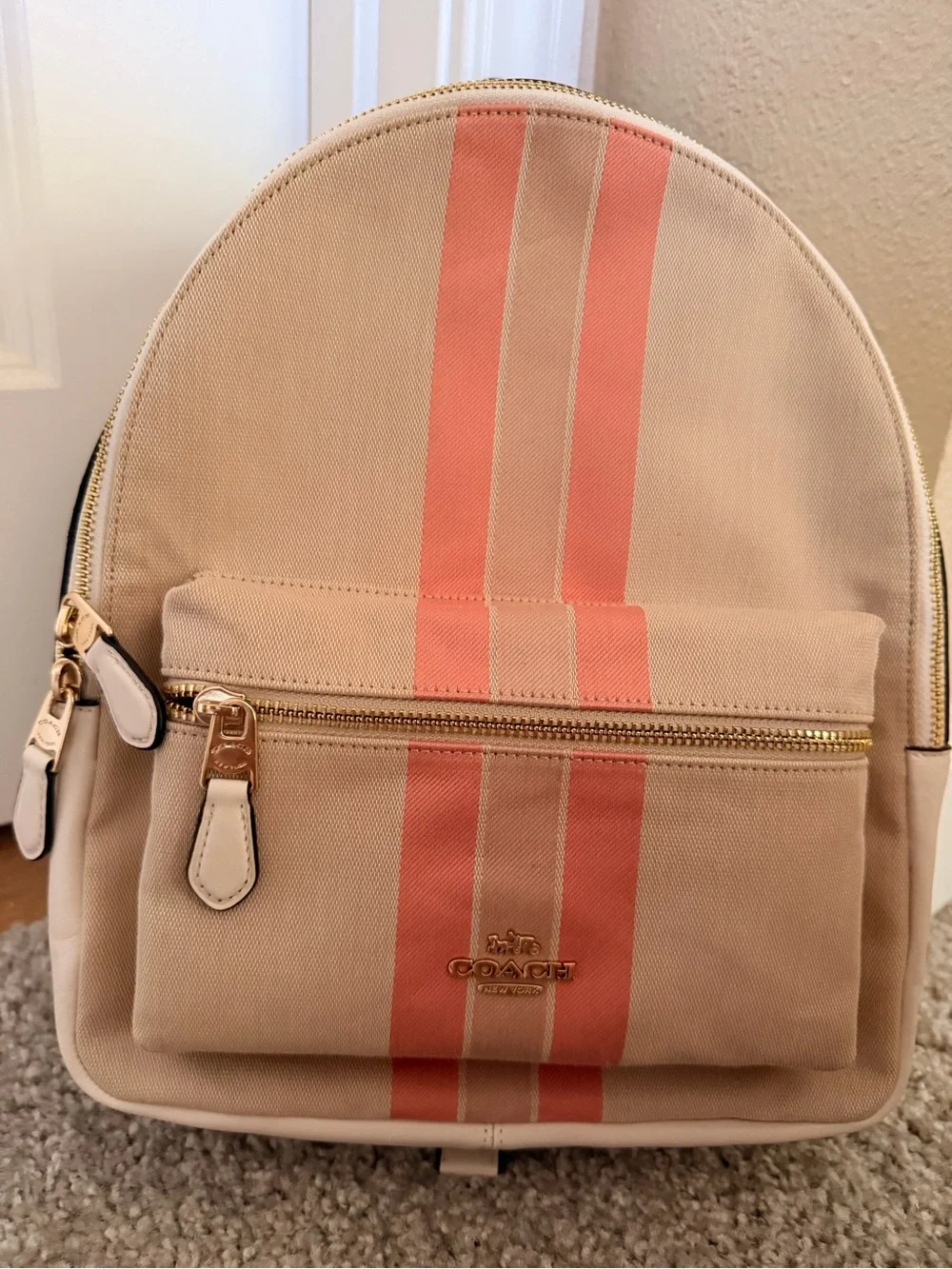 Coach Beige Canvas Backpack with Pink Stripe Accents